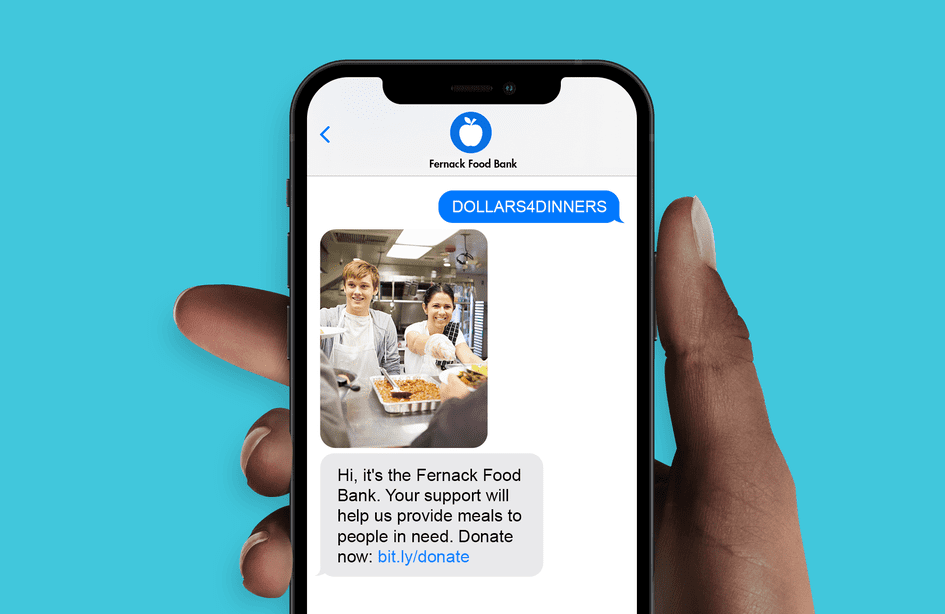 A nonprofit text messaging example, which features the keyword “DOLLARS4DINNERS” to get the donation page link.